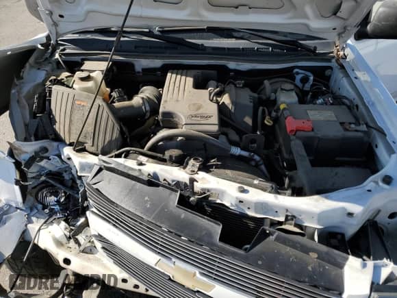 2012 Chevrolet Colorado Work Truck z VIN 1GCCSBF97C8167325, wystawiony jako Copart lot #63853845 z przebiegiem 117 053 mil mil oraz Szkoda całkowita • Salvage title. Historia ofert i sprzedaży dostępna na DreamBid. Obrazek 11.