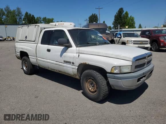 2002 Dodge 2500 with VIN 3B7KC23Z62M212116, listed as a Copart auction lot 58445855 with 246,902 mi miles and Clean title. Bid and sale history available at DreamBid. Image 4.