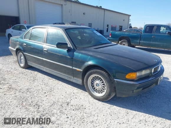 1998 BMW 7 Series 740iL with VIN WBAGJ8323WDM13455, listed as a IAAI auction lot 41888636 with Not provided miles and . Bid and sale history available at DreamBid. Image 1.