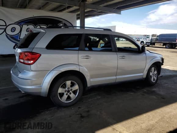 2011 Dodge Journey Mainstreet с VIN 3D4PG1FG0BT517764, выставлен на аукционе Copart как лот 81807505 с пробегом 151 594 миль миль и Списание • Salvage title. История ставок и продаж доступна на DreamBid. Изображение 3.