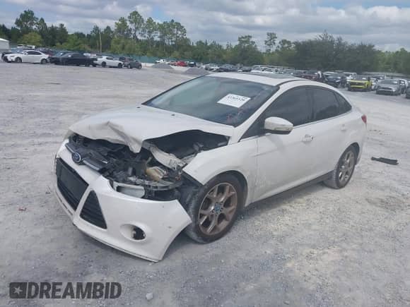 2013 Ford Focus Titanium with VIN 1FADP3J26DL112486, listed as a IAAI auction lot 43365520 with 223,173 mi miles and . Bid and sale history available at DreamBid. Image 17.