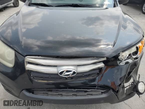 2012 Hyundai Santa Fe Limited z VIN 5XYZK4AG9CG107132, wystawiony jako Copart lot #60558455 z przebiegiem 189 403 mil mil oraz Szkoda całkowita • Salvage title. Historia ofert i sprzedaży dostępna na DreamBid. Obrazek 12.