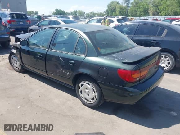 2001 Saturn SL with VIN 1G8ZK527X1Z238857, listed as a IAAI auction lot 42460370 with 76,231 mi miles and . Bid and sale history available at DreamBid. Image 3.