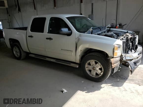 2012 Chevrolet Silverado 1500 LT с VIN 1GCPKSE79CF223911, выставлен на аукционе Copart как лот 81384155 с пробегом 135 781 миль миль и Списание • Salvage title. История ставок и продаж доступна на DreamBid. Изображение 4.