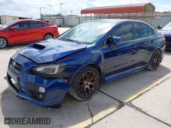 2015 Subaru WRX with VIN JF1VA1A60F9834324, listed as a IAAI auction lot 42683294 with 150,398 mi miles and . Bid and sale history available at DreamBid. Image 2.