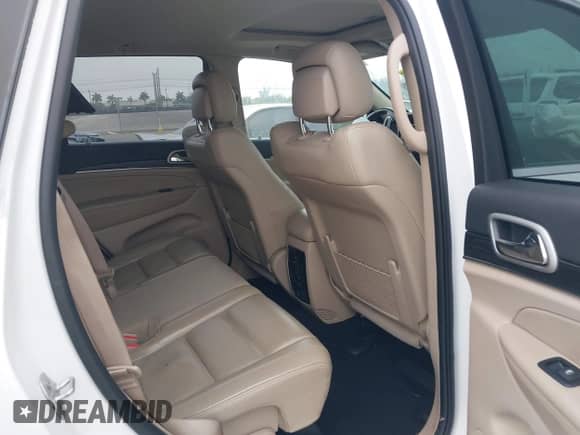 2021 Jeep Grand Cherokee Limited with VIN 1C4RJEBG3MC636296, listed as a IAAI auction lot 41876341 with 63,537 mi miles and . Bid and sale history available at DreamBid. Image 8.