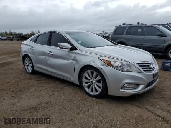 2013 Hyundai Azera с VIN KMHFH4JG6DA270769, выставлен на аукционе Copart как лот 86630765 с пробегом 133 252 миль миль и Списание • Salvage title. История ставок и продаж доступна на DreamBid. Изображение 4.