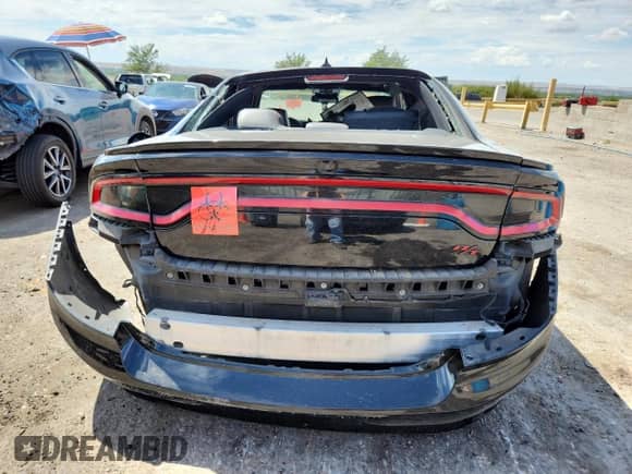 2016 Dodge Charger Road/Track with VIN 2C3CDXCT1GH249014, listed as a Copart auction lot 69318095 with Not provided miles and Salvage title. Bid and sale history available at DreamBid. Image 6.