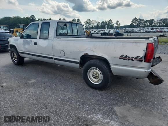 1990 Chevrolet Silverado 2500 с VIN 2GCFK29K8L1148748, выставлен на аукционе Copart как лот 64077805 с пробегом 221 372 миль миль и Списание • Salvage title. История ставок и продаж доступна на DreamBid. Изображение 2.