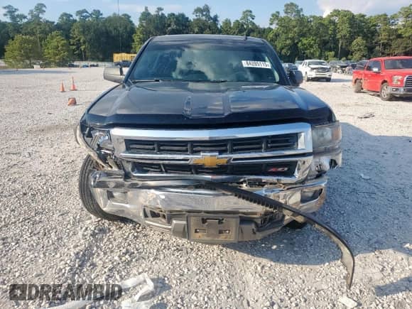 2014 Chevrolet Silverado 1500 LT z VIN 3GCUKREC3EG104049, wystawiony jako Copart lot #84285115 z przebiegiem 233 829 mil mil oraz Szkoda całkowita • Salvage title. Historia ofert i sprzedaży dostępna na DreamBid. Obrazek 5.
