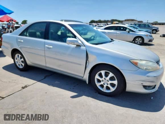 2006 Toyota Camry XLE с VIN 4T1BF32KX6U117976, выставлен на аукционе Copart как лот 67221655 с пробегом 152 103 миль миль и Списание • Salvage title. История ставок и продаж доступна на DreamBid. Изображение 4.