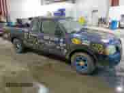 2001 Nissan Frontier XE with VIN 1N6DD26S91C404129, listed as a Copart auction lot 60164595 with 217,667 mi miles and Clean title. Bid and sale history available at DreamBid. Image 4.