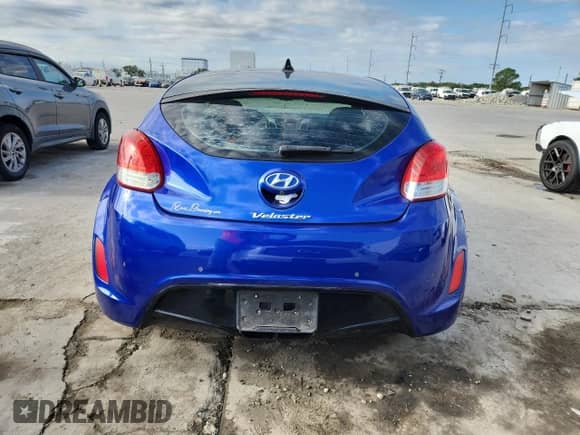 2014 Hyundai Veloster с VIN KMHTC6AD4EU182774, выставлен на аукционе Copart как лот 86715985 с пробегом 183 273 миль миль и Списание • Salvage title. История ставок и продаж доступна на DreamBid. Изображение 6.