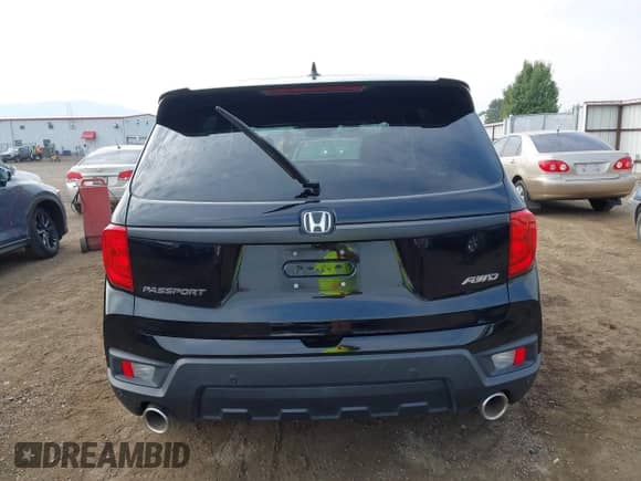 2022 Honda Passport EX-L with VIN 5FNYF8H59NB024628, listed as a IAAI auction lot 43084397 with 33,671 mi miles and . Bid and sale history available at DreamBid. Image 17.