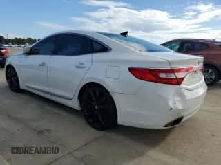 2014 Hyundai Azera Limited с VIN KMHFH4JG2EA346683, выставлен на аукционе Copart как лот 74352634 с пробегом Не указан миль и Списание • Salvage title. История ставок и продаж доступна на DreamBid. Изображение 2.