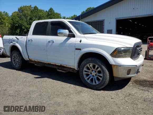 2016 Ram 1500 Laramie with VIN 1C6RR7NM2GS338040, listed as a Copart auction lot 70941005 with 215,857 mi miles and Clean title. Bid and sale history available at DreamBid. Image 4.
