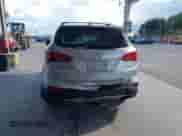 2014 Hyundai Santa Fe z VIN 5XYZU3LB3EG206926, wystawiony jako IAAI lot #43301222 z przebiegiem 134 184 mil mil oraz . Historia ofert i sprzedaży dostępna na DreamBid. Obrazek 16.