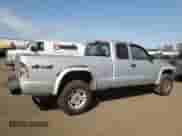 2003 Dodge Dakota с VIN 1D7HG12XX3S334064, выставлен на аукционе Copart как лот 48554465 с пробегом 140 660 миль миль и На запчасти • Non repairable. История ставок и продаж доступна на DreamBid. Изображение 3.