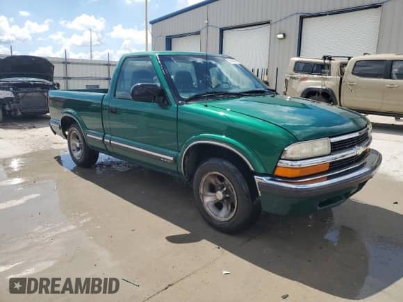 1999 Chevrolet S-10 с VIN 1GCCS14XXX8197212, выставлен на аукционе Copart как лот 56590995 с пробегом 201 771 миль миль и Списание • Salvage title. История ставок и продаж доступна на DreamBid. Изображение 4.