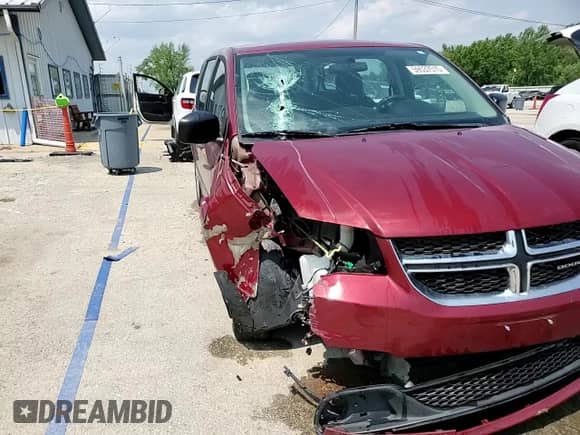 2016 Dodge Grand Caravan SE z VIN 2C4RDGBG4GR243650, wystawiony jako Copart lot #59537515 z przebiegiem 83 559 mil mil oraz Szkoda całkowita • Salvage title. Historia ofert i sprzedaży dostępna na DreamBid. Obrazek 14.