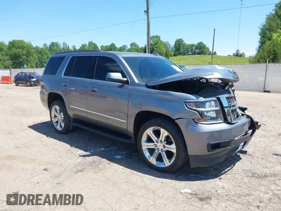 2020 Chevrolet Tahoe LT with VIN 1GNSCBKC3LR204995, listed as a IAAI auction lot 42292566 with 64,874 mi miles and . Bid and sale history available at DreamBid. Image 1.