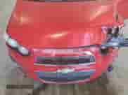 2013 Chevrolet Sonic LTZ с VIN 1G1JE5SG0D4164711, выставлен на аукционе Copart как лот 81845895 с пробегом 136 844 миль миль и Списание • Salvage title. История ставок и продаж доступна на DreamBid. Изображение 11.