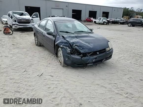 2002 Dodge Neon SE z VIN 1B3ES46C02D501704, wystawiony jako Copart lot #83476794 z przebiegiem 187 860 mil mil oraz Szkoda całkowita • Salvage title. Historia ofert i sprzedaży dostępna na DreamBid. Obrazek 11.