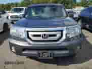 2010 Honda Pilot Touring with VIN 5FNYF4H9XAB005981, listed as a Copart auction lot 71617615 with 183,441 mi miles and Salvage title. Bid and sale history available at DreamBid. Image 5.