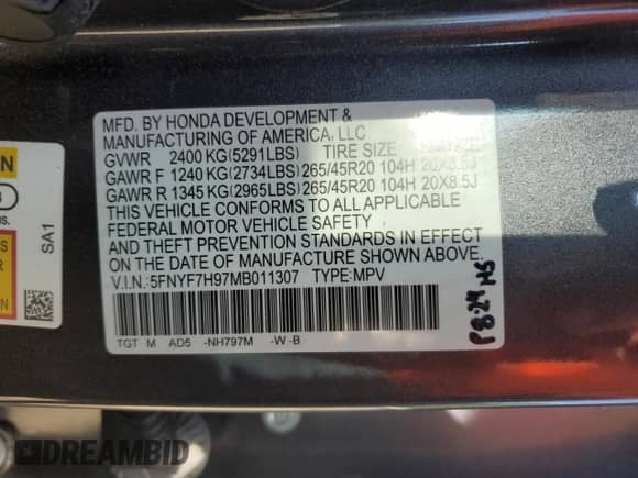 2021 Honda Passport Touring with VIN 5FNYF7H97MB011307, listed as a Copart auction lot 52310415 with 72,118 mi miles and Salvage title. Bid and sale history available at DreamBid. Image 13.
