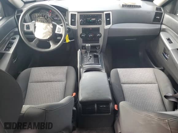 2009 Jeep Grand Cherokee Laredo with VIN 1J8GR48K99C531235, listed as a Copart auction lot 84378915 with 86,974 mi miles and Salvage title. Bid and sale history available at DreamBid. Image 8.