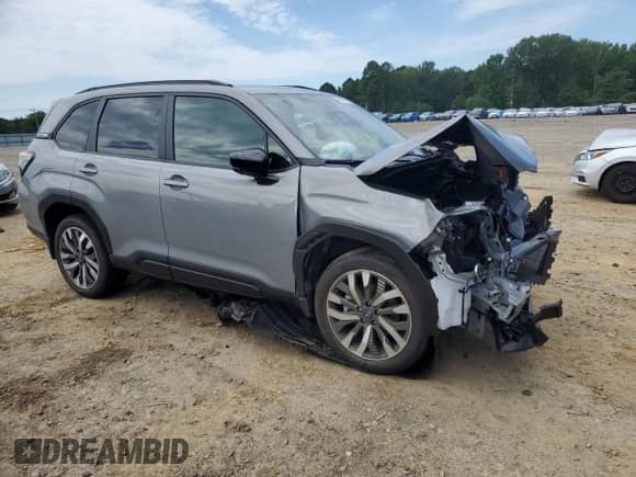 2025 Subaru Forester Touring z VIN JF2SLDTC1SH569328, wystawiony jako Copart lot #68958125 z przebiegiem Nie podano mil oraz Szkoda całkowita • Salvage title. Historia ofert i sprzedaży dostępna na DreamBid. Obrazek 4.