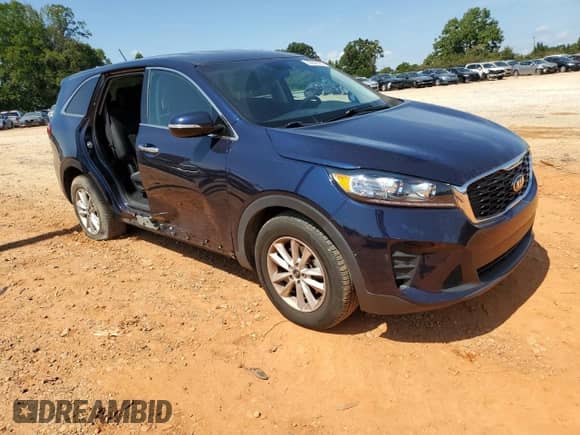 2020 Kia Sorento LX z VIN 5XYPG4A36LG708570, wystawiony jako Copart lot #80859395 z przebiegiem 67 092 mil mil oraz Szkoda całkowita • Salvage title. Historia ofert i sprzedaży dostępna na DreamBid. Obrazek 4.
