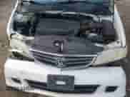 2002 Honda Odyssey EX z VIN 2HKRL18682H551537, wystawiony jako Copart lot #84208275 z przebiegiem 128 632 mil mil oraz Szkoda całkowita • Salvage title. Historia ofert i sprzedaży dostępna na DreamBid. Obrazek 12.