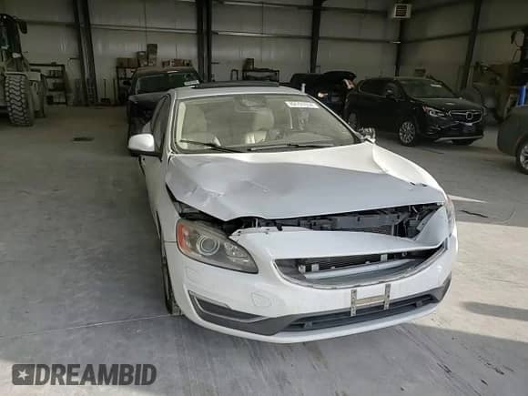 2015 Volvo S60 T5 Platinum с VIN YV1612TM8F2352980, выставлен на аукционе Copart как лот 82701654 с пробегом Не указан миль и Списание • Salvage title. История ставок и продаж доступна на DreamBid. Изображение 11.