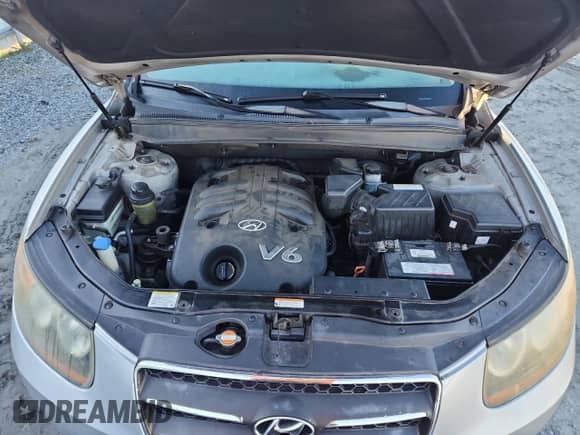 2007 Hyundai Santa Fe SE z VIN 5NMSH13E77H128423, wystawiony jako Copart lot #82700565 z przebiegiem 219 545 mil mil oraz Czysty tytuł • Clean title. Historia ofert i sprzedaży dostępna na DreamBid. Obrazek 12.