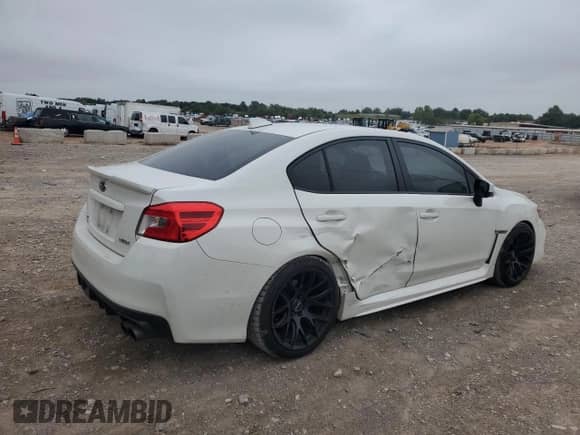 2020 Subaru WRX Premium with VIN JF1VA1C62L9814875, listed as a Copart auction lot 70986585 with 76,047 mi miles and Salvage title. Bid and sale history available at DreamBid. Image 3.