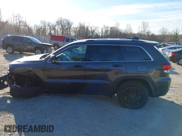 2021 Jeep Grand Cherokee 80th Anniversary with VIN 1C4RJFBG5MC737412, listed as a IAAI auction lot 41753550 with 54,921 mi miles and . Bid and sale history available at DreamBid. Image 14.