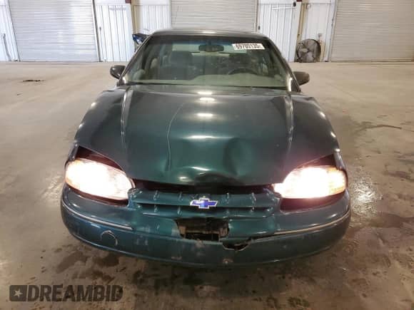 2001 Chevrolet Lumina z VIN 2G1WL52J311159761, wystawiony jako Copart lot #69700135 z przebiegiem 93 594 mil mil oraz Szkoda całkowita • Salvage title. Historia ofert i sprzedaży dostępna na DreamBid. Obrazek 5.