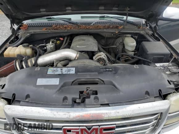 2004 GMC Sierra 1500 SLT z VIN 1GTEK19T14Z146489, wystawiony jako Copart lot #66932135 z przebiegiem 332 391 mil mil oraz Szkoda całkowita • Salvage title. Historia ofert i sprzedaży dostępna na DreamBid. Obrazek 11.