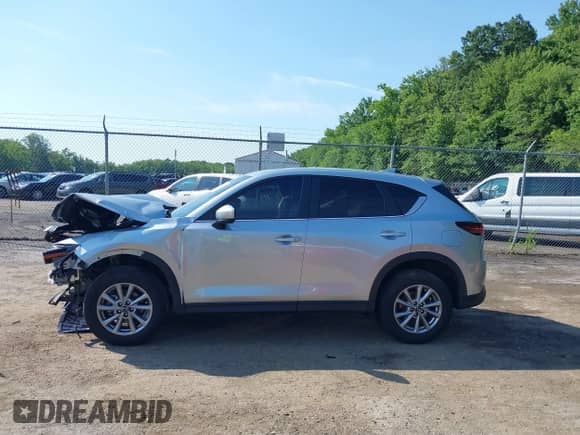 2023 Mazda CX-5 S Preferred z VIN JM3KFBCM2P0191455, wystawiony jako IAAI lot #42653952 z przebiegiem 49 488 mil mil oraz . Historia ofert i sprzedaży dostępna na DreamBid. Obrazek 14.