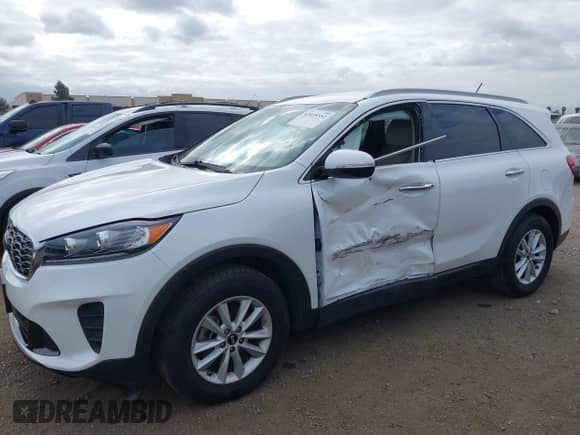 2020 Kia Sorento LX with VIN 5XYPG4A32LG642891, listed as a IAAI auction lot 42035551 with 32,052 mi miles and . Bid and sale history available at DreamBid. Image 6.