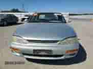 1995 Toyota Camry LE z VIN 4T1GK12E7SU092786, wystawiony jako Copart lot #81152935 z przebiegiem 184 695 mil mil oraz Czysty tytuł • Clean title. Historia ofert i sprzedaży dostępna na DreamBid. Obrazek 5.