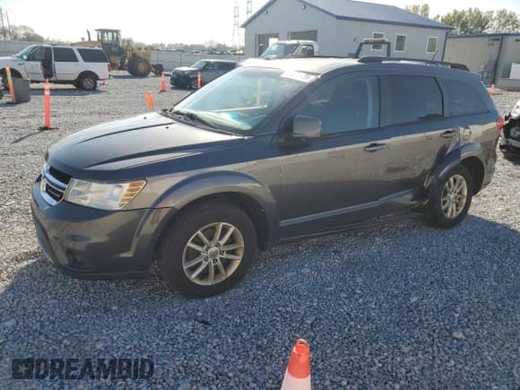 2014 Dodge Journey SXT with VIN 3C4PDCBG9ET142064, listed as a Copart auction lot 84588885 with 168,463 mi miles and Salvage title. Bid and sale history available at DreamBid. Image 1.