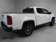2020 Chevrolet Colorado 4WD ZR2 с VIN 1GCPTEE19L1134962, выставлен на аукционе Copart как лот 49314485 с пробегом 143 005 миль миль и Списание • Salvage title. История ставок и продаж доступна на DreamBid. Изображение 3.