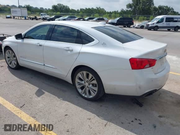 2016 Chevrolet Impala LTZ with VIN 2G1145S33G9199454, listed as a IAAI auction lot 42755860 with 96,410 mi miles and . Bid and sale history available at DreamBid. Image 3.