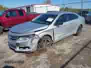 2014 Chevrolet Impala LS with VIN 1G11Y5SL0EU121735, listed as a IAAI auction lot 43403934 with 157,328 mi miles and . Bid and sale history available at DreamBid. Image 2.