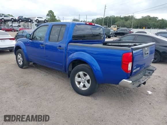 2013 Nissan Frontier SV with VIN 1N6AD0EV3DN762662, listed as a IAAI auction lot 43420036 with 118,397 mi miles and . Bid and sale history available at DreamBid. Image 3.