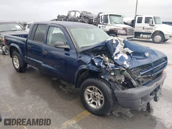 2003 Dodge Dakota Sport z VIN 1D7HL38X13S381160, wystawiony jako IAAI lot #42191397 z przebiegiem 97 752 mil mil oraz . Historia ofert i sprzedaży dostępna na DreamBid. Obrazek 1.