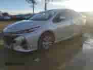 2022 Toyota Prius Limited with VIN JTDKAMFPXN3210371, listed as a Copart auction lot 87244264 with 55,591 mi miles and Salvage title. Bid and sale history available at DreamBid. Image 1.