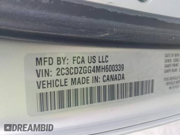 2021 Dodge Challenger SXT z VIN 2C3CDZGG4MH600339, wystawiony jako IAAI lot #42210641 z przebiegiem 95 238 mil mil oraz . Historia ofert i sprzedaży dostępna na DreamBid. Obrazek 9.